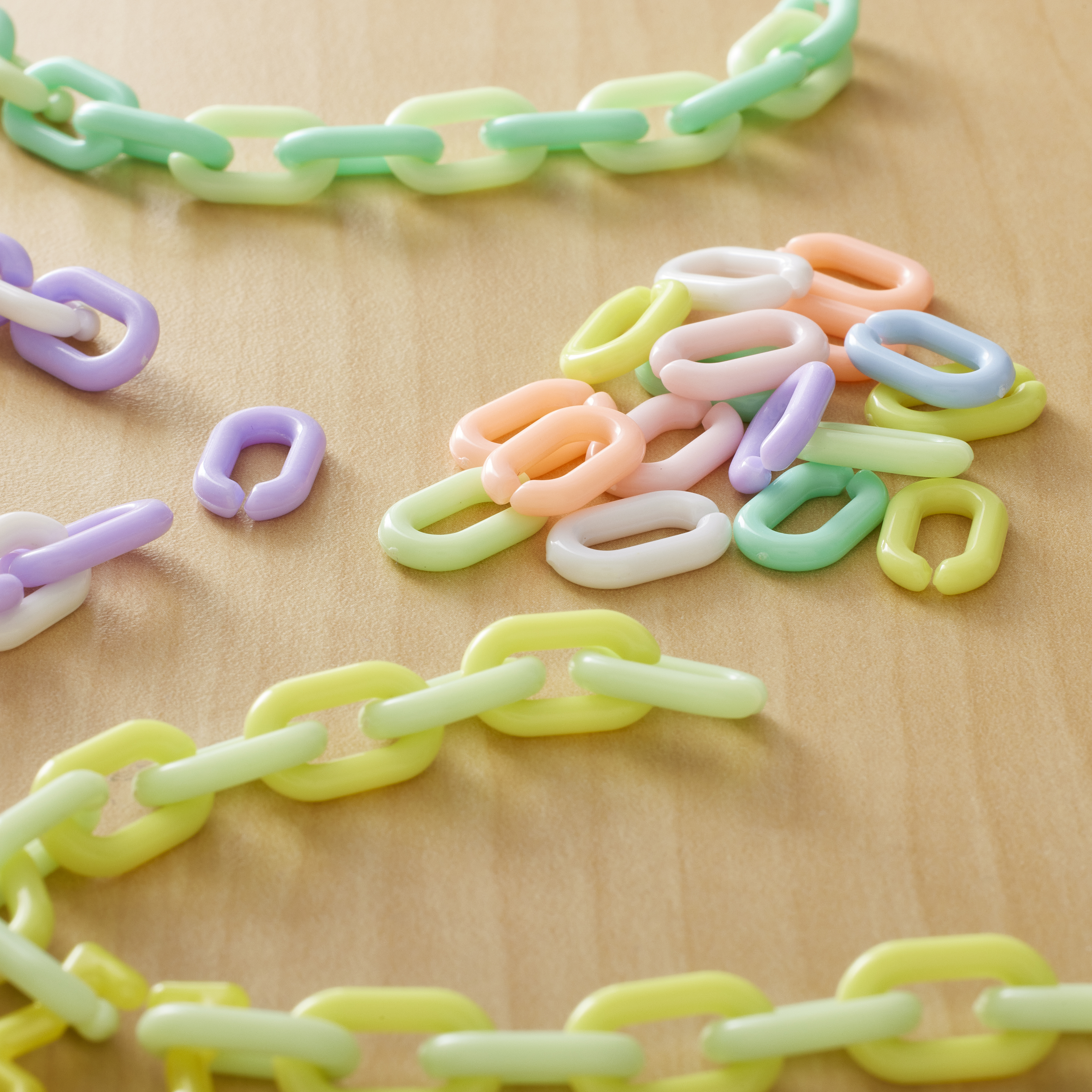 Michaels Bulk 12 Packs: 400 Ct. (4,800 Total) Pastel Plastic Chain Links by Creatology, Girl's, Size: 0.55 x 0.35, Assorted